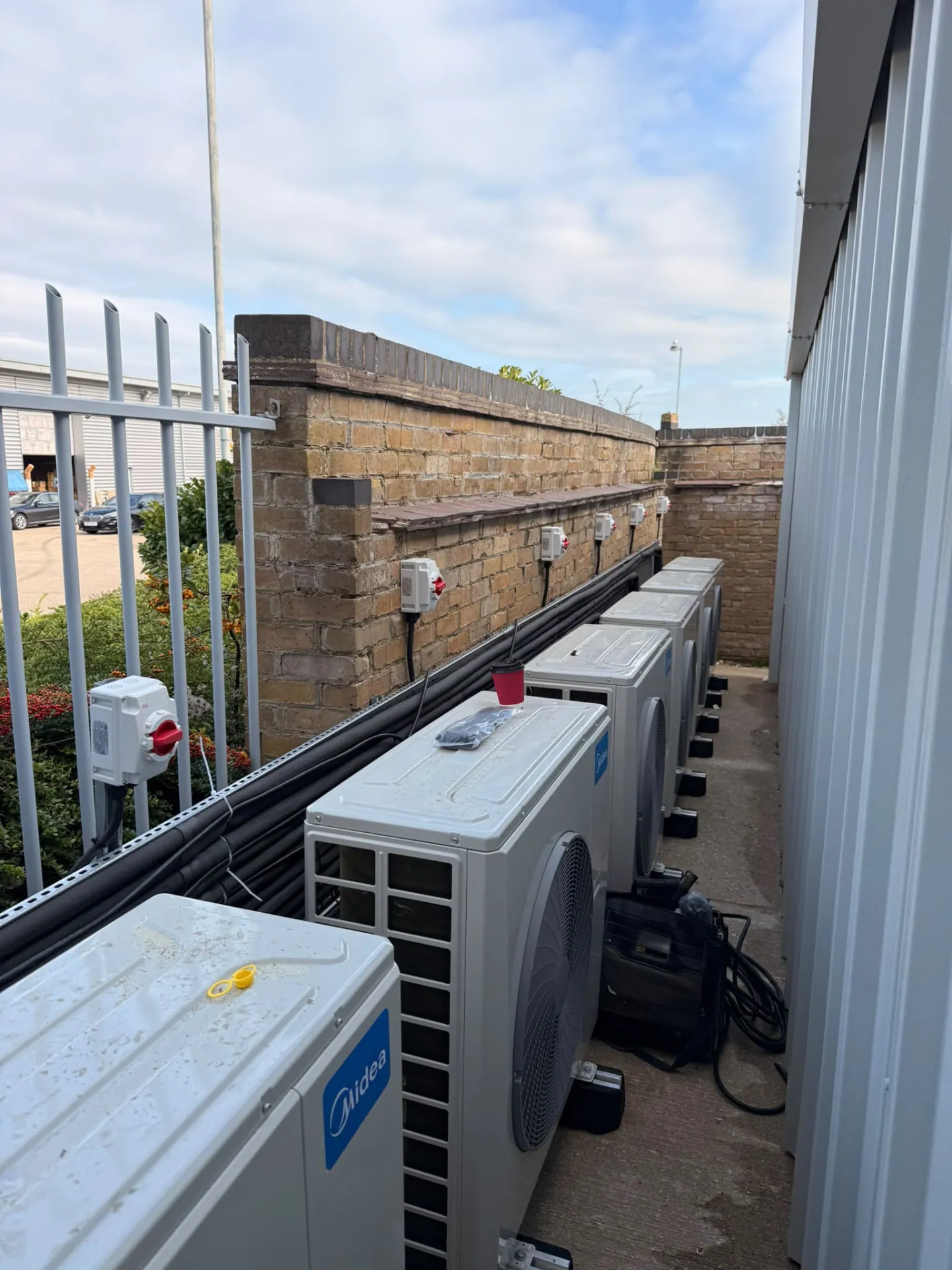 Commercial air conditioning units with electrical supply installed