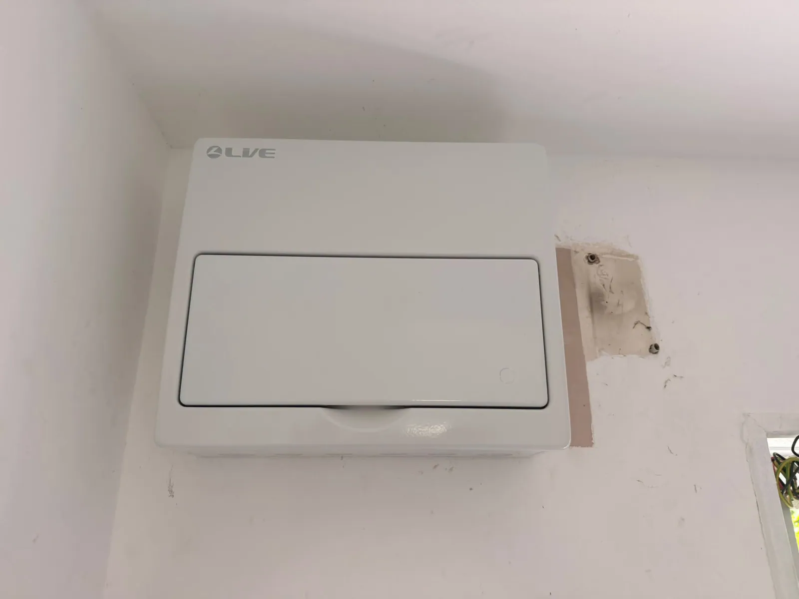 Neat white consumer unit enclosure after upgrade