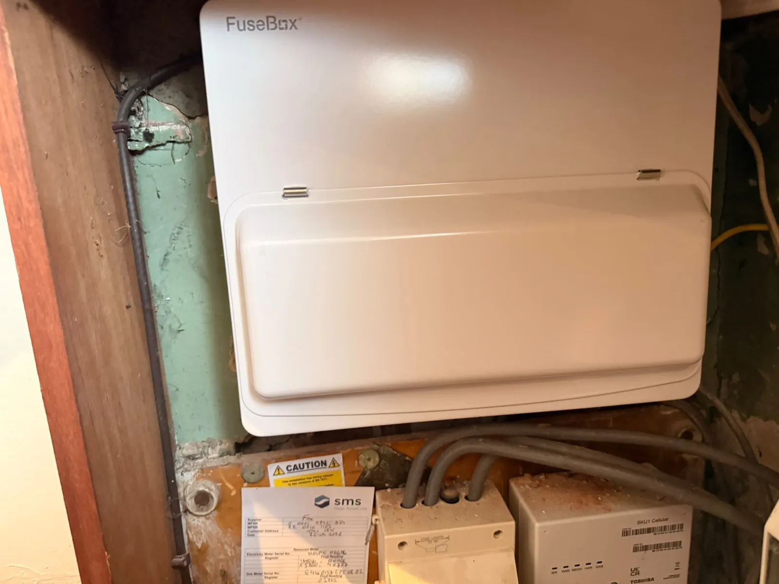 Consumer unit installed above existing meter equipment