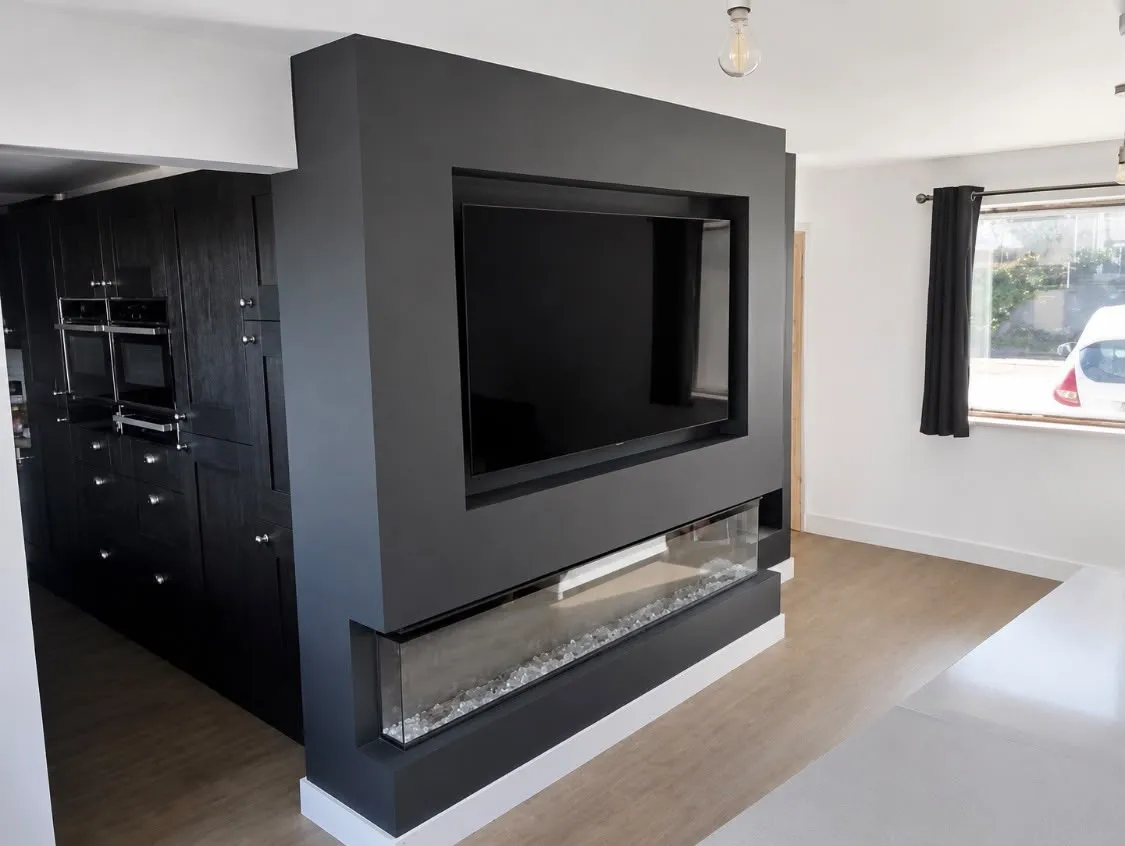 Media wall electrics for a recessed TV and electric fire