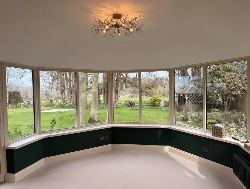 Garden room with a branch-style ceiling light and new sockets installed